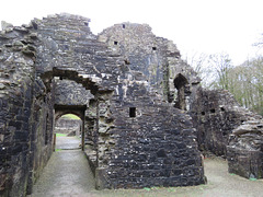 okehampton castle, devon , c14 passage from hall to kitchens(2)
