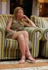 sitting on an armchair