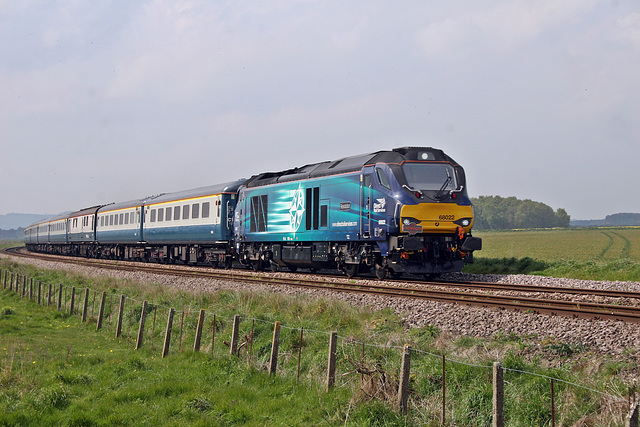 DRS class 68 68022 RESOLUTION with 1Z68 Pathfinder Tours The Yorkshire Moors Explorer Swindon - Scarborough at Willerby Car Crossing 29th April 2017 the first class 68 to come to Scarborough