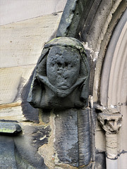 sandiacre church, derbs ; c14 headstop on chancel priest's doorway