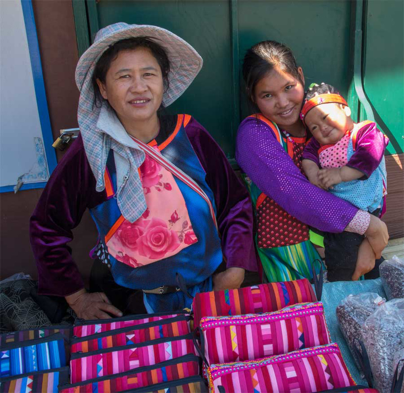 Lanna tribeswomen at their stall outide Pai