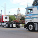 Photo #3...The three big rigs escorting the tractor trailer that is following with the deceased truck driver.  ( our County Courthouse in background)