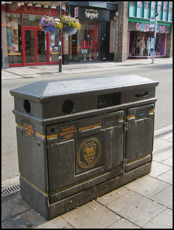 black and gold recycling bin