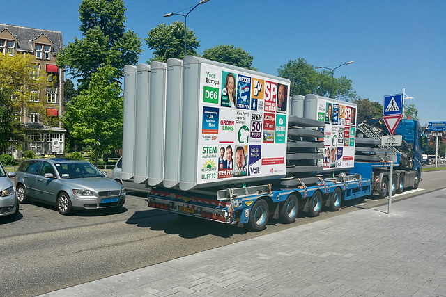 Politicians are carted away after the election