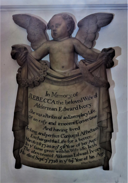 all saints church, northampton , northants (14)cherub holding cloth with tomb epitaph of rebecca ivory +1720