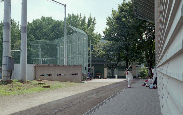 Waiting for their turn at a baseball ground