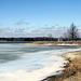 Still ice covered lake in Michigan.