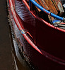 A Boat. Light, Ripples, Rust And Rot