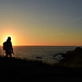 Young lady ponders the Irish sunset.