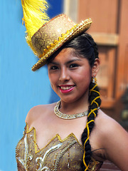 Smile from a dancer at the folklore Club Brisas del Titicaca.
