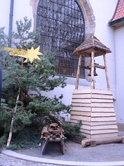 Kometo ĉe la Betlehema kapelo en Prago kondukanta al tradicia kristnaska ekspozicio en la kelaro