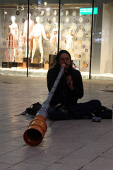 Playing his didgeridoo