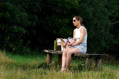 Lady and her dog on a bench!