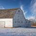 weathered white barn