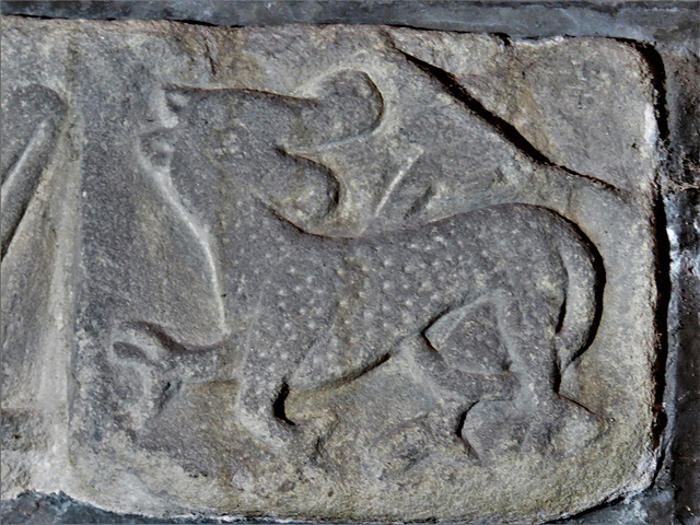 wirksworth church, derbs ; c12 beast from doorway