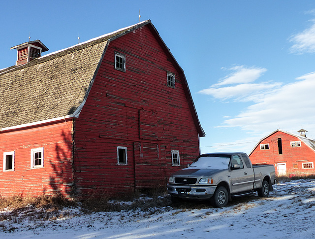 Both barns in a drive-by shot