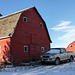 Both barns in a drive-by shot