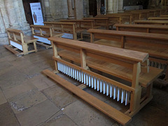 Heating under the pews.