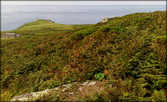 Bosigran Head and the Carn Galva Tin Mine Count House from the approaches to Carn Galva.