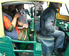 Delhi- Smiling Girls in an Auto Rickshaw