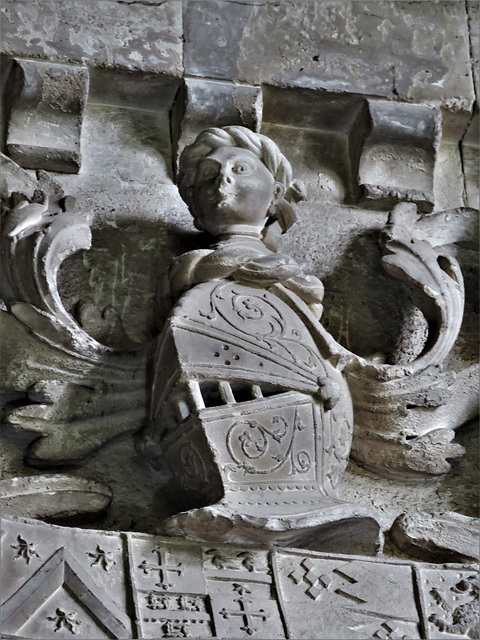 turvey church, beds  (35)saracen crest on arms over the effigies of the 1st lord mordaunt +1560 and wife on the c16 tomb attributed to t.kirby