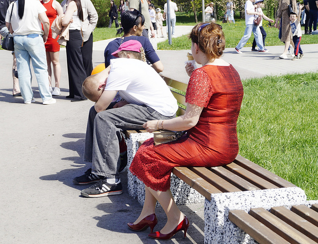 Lady in red eating ice cream