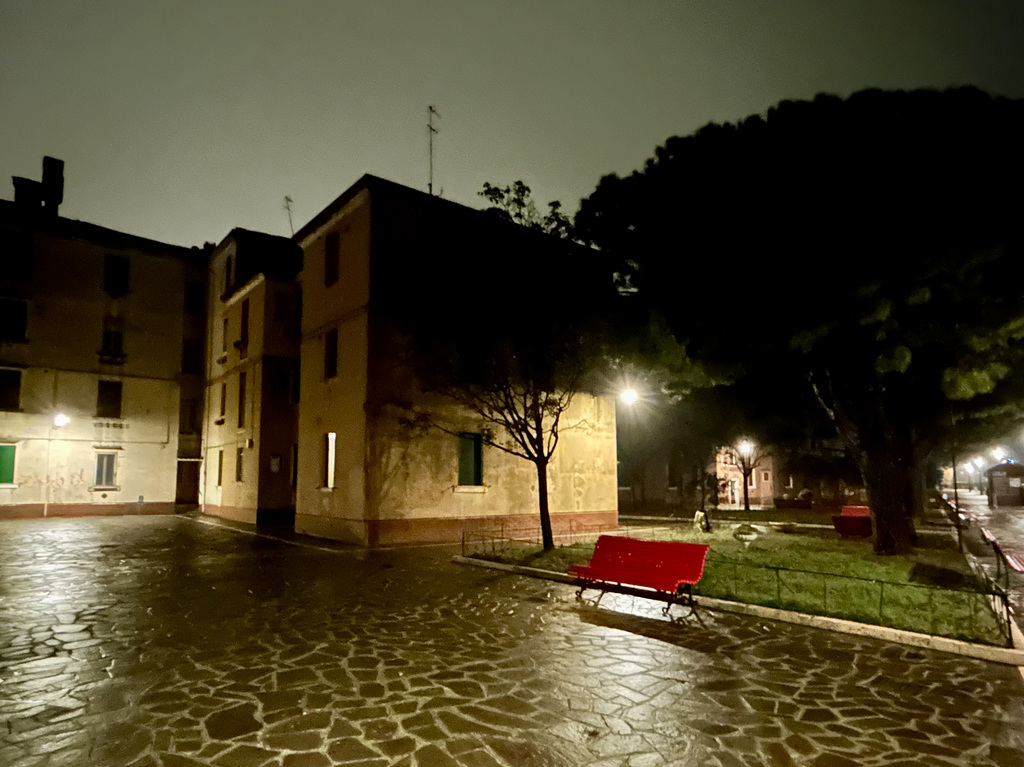 Empty bench by night.