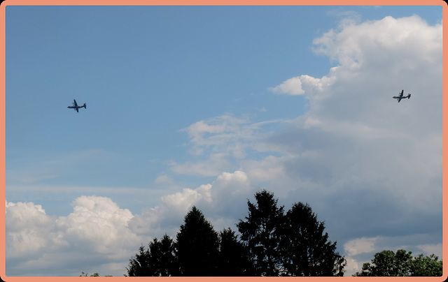 How these two older planes had to fly,over 5 times in different formations on Sunday afternoon--and then a fighter jet with its tearing noise