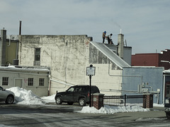 Two Men on the Roof