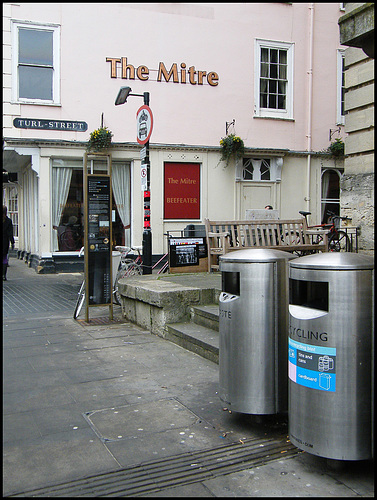 ugly metal bins and info board