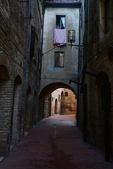 Italy, Walking in the Maze of Medieval Streets of San Gimignano