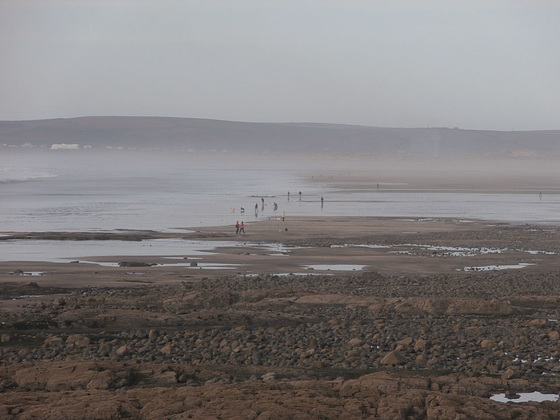 Very determined walkers on the beach plus the odd surfer