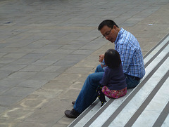 Conversation on a stair- bench