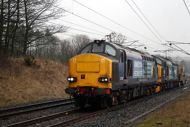 DRS class 37`s 37259+37609 with 6K74 09.09 Sellafield B.N.F.  - Crewe Coal Sidings Nuclear flask at Beckfoot 11th March 2017