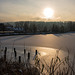 Frozen lake in the evening sun