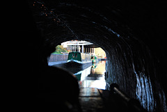 Canal boat leaving the tunnel.