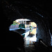 Canal boat leaving the tunnel.