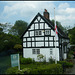 cottage with flagpole