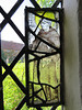 sissinghurst castle, kent   (8)late c16 saint in glass on the tower stair, possibly st francis