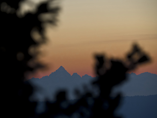 Profiles of a late autumn afternoon - The pyramid of Monviso at sunset