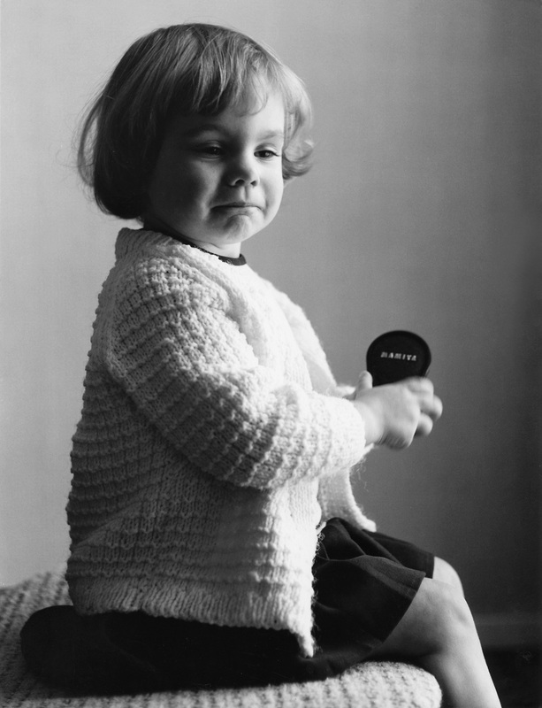 Informal portrait with lens cap