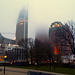 Buildings disappearing into the clouds