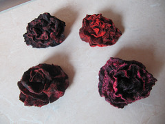 felted black and red brooches