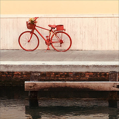 The red bicycle.