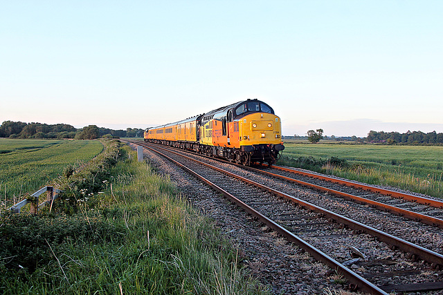 COLAS RAIL FREIGHT class 37`s 37254 CARDIFF CANTON tnt 37099 MERL EVANS 1947-2016 with 1Q64 08.52 Derby RTC - Doncaster CHS at Willerby Carr crossing 1st June 2020.