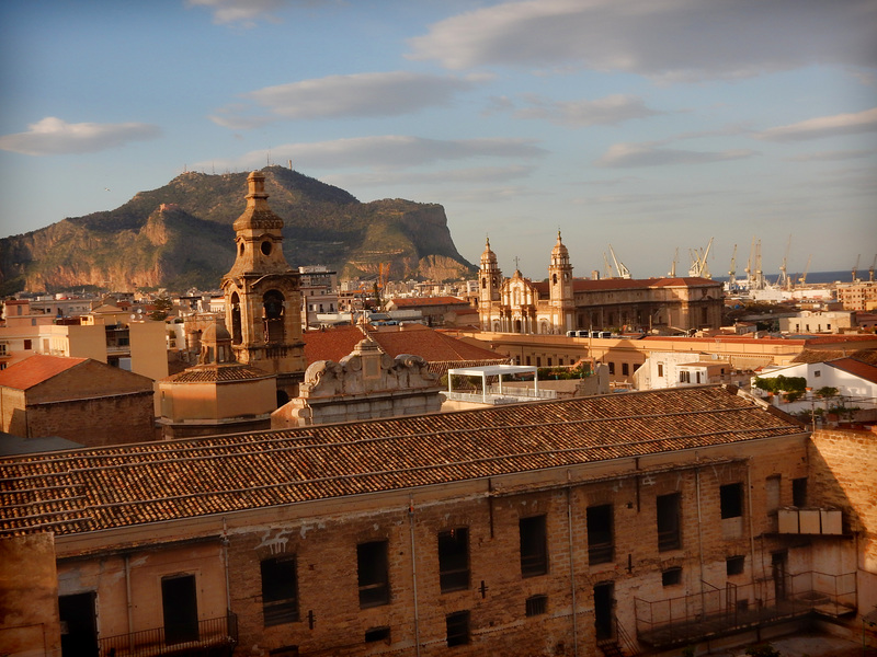 rooftops, steeples and the distant sea