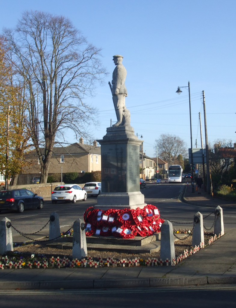 War Memorial, Poppies and Whippet Coaches (National Express contractor) NX28 (BV67 JZN) in Mildenhall - 18 Nov 2018 (DSCN5443)