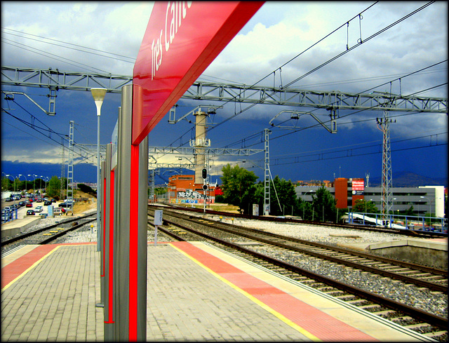 Tres Cantos railway station. Storm approaching from the Sierra de Guadarrama.
