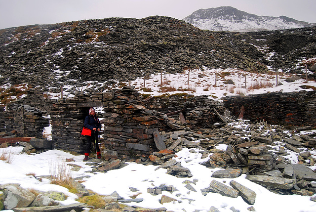 Derelict walls of Bwlch Cwm Llan quarry (and a lady with red bag)