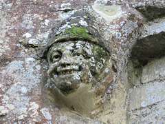 east knoyle church, wilts , cheerful head on the tower, prob c19